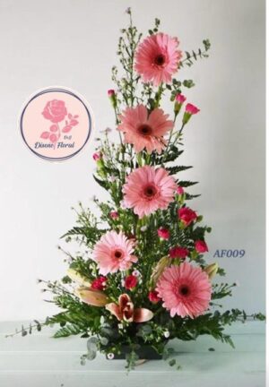 Arreglo floral gerberas, clavellinas y lirios