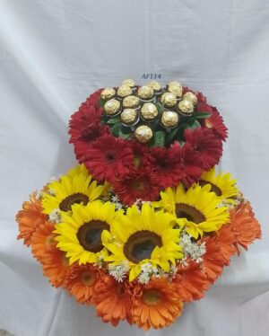 Arreglo floral gerberas, girasoles y chocolates