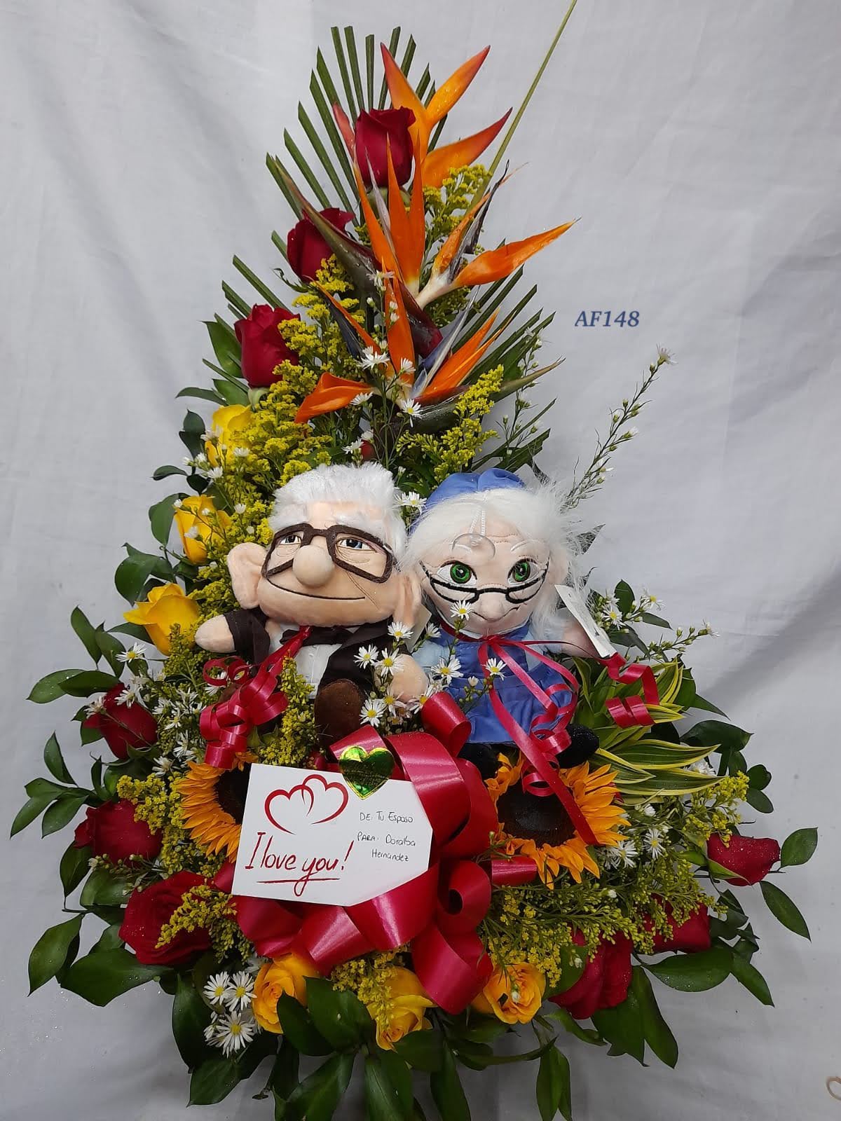 Arreglo floral rosas, aves y abuelitos