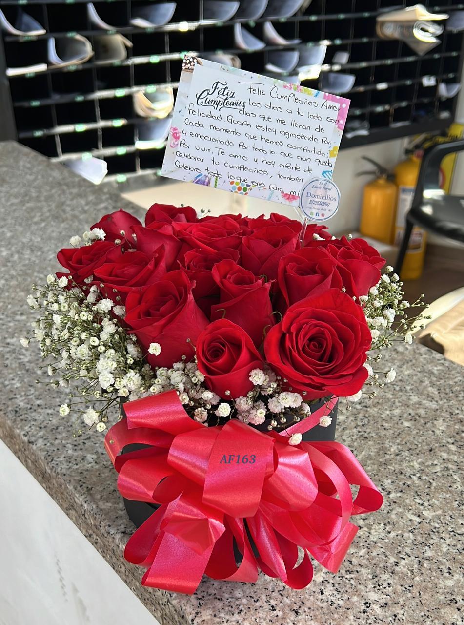 Cilindro rosas rojas