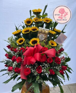 Canasto floral girasoles, rosas y chocolates