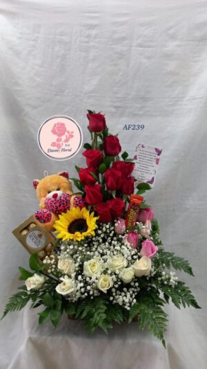 Arreglo floral peluche y chocolates